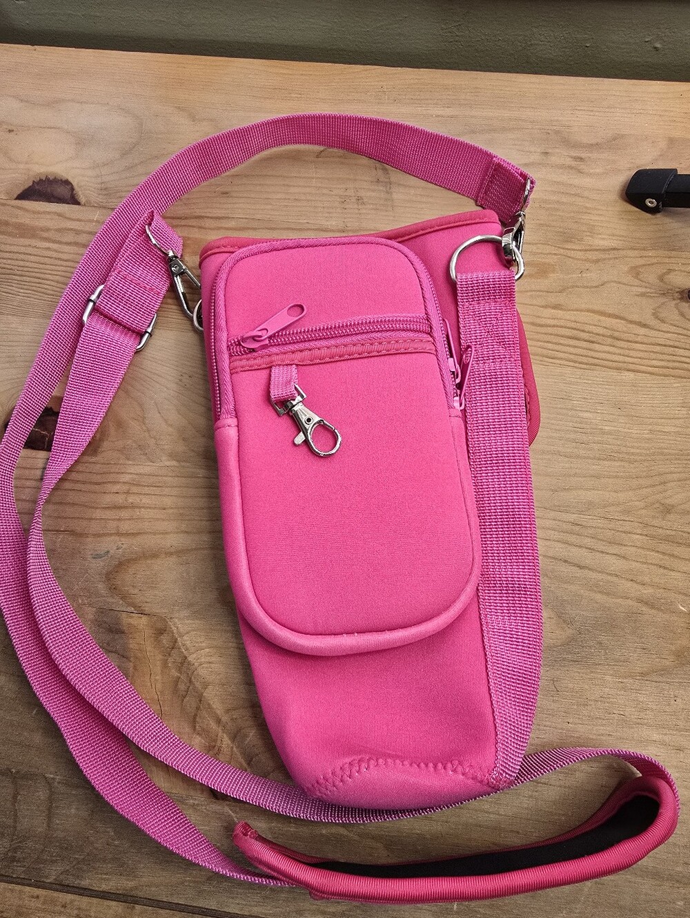 Hot pink neoprene crossbody water bottle holder